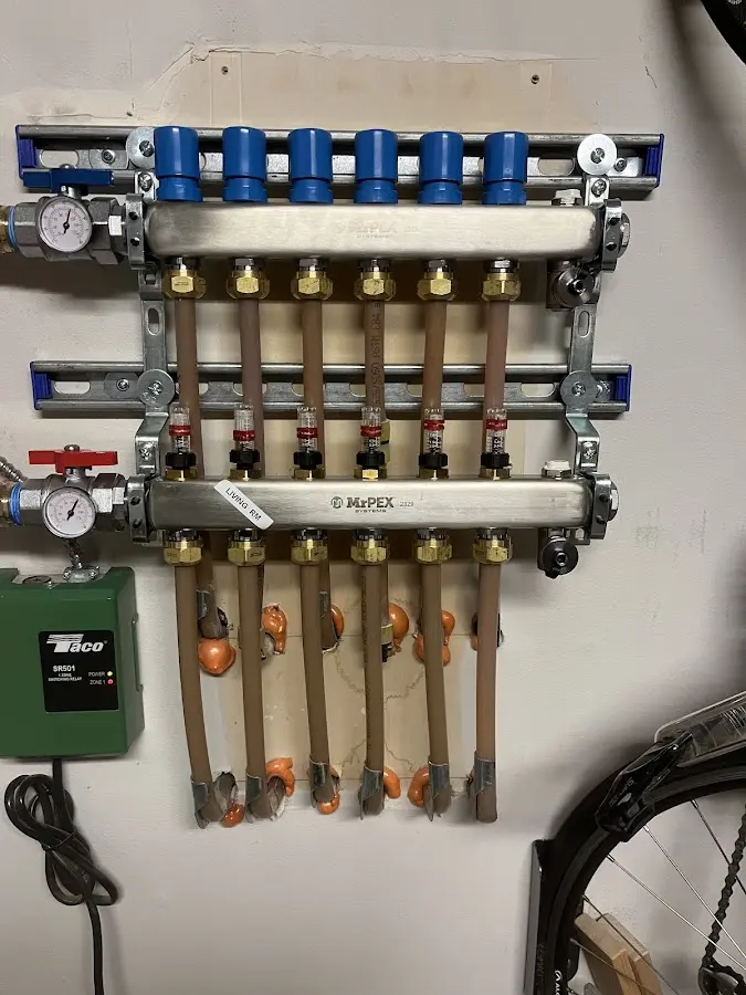 Plumber performing Water Heater Repair at a residential property in Westbrook